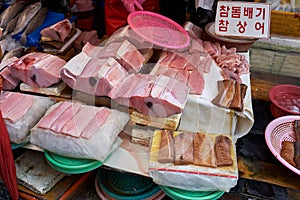 View of ì°¸ë”ë°°ê¸°shark meat and ì°¸ìƒì–´shark meat displayed for sale at the Haeundae Sunrise market in Busan, South Korea